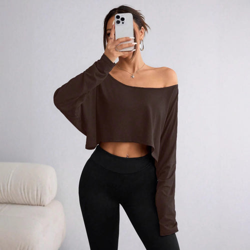 A loose one-shoulder blouse
